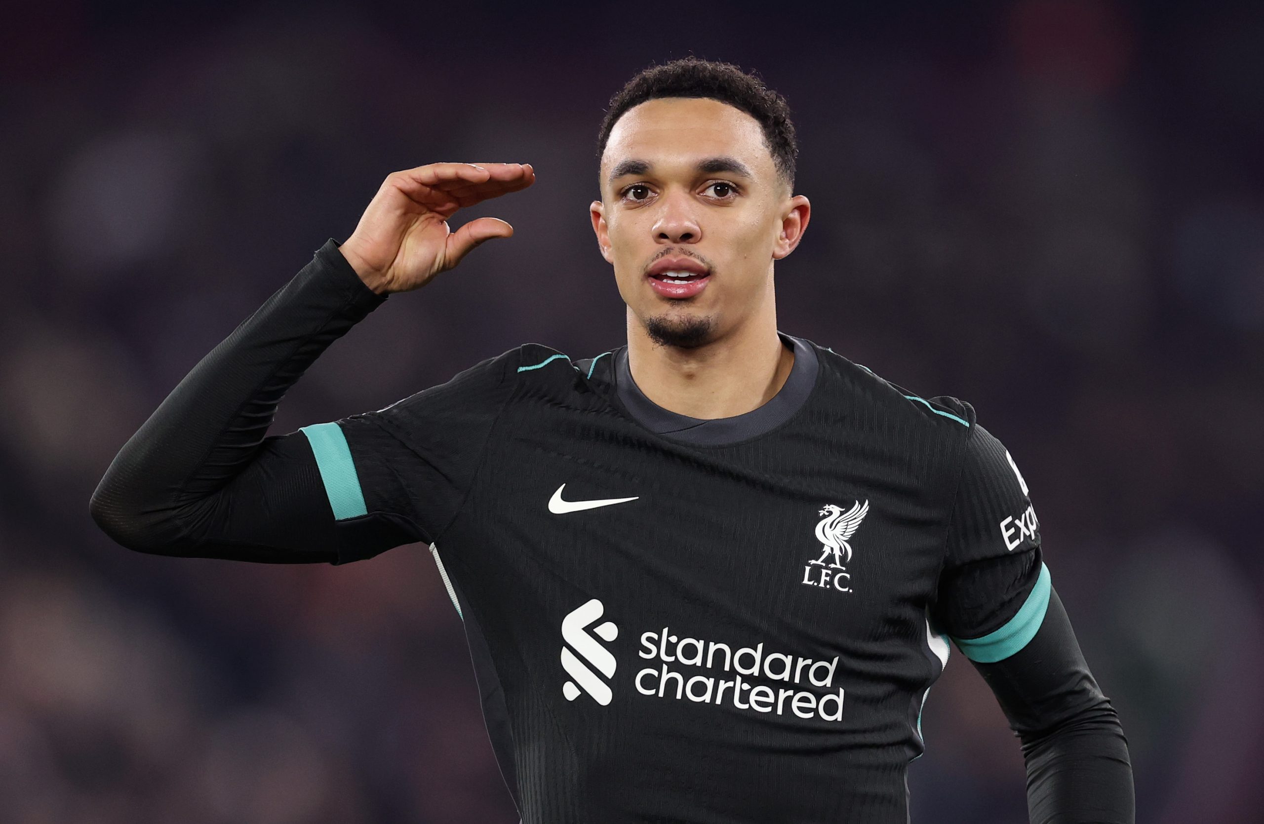 LONDON, ENGLAND - DECEMBER 29: Trent Alexander-Arnold of Liverpool celebrates scoring his team's fourth goal during the Premier League match between West Ham United FC and Liverpool FC at London Stadium on December 29, 2024 in London, England. (Photo by Julian Finney/Getty Images)